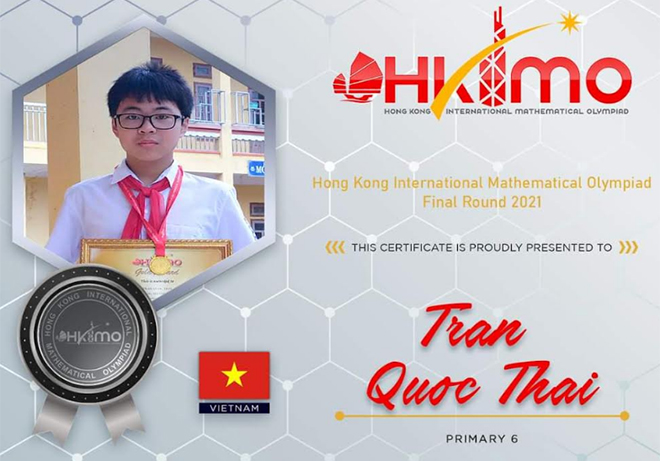 Em Trần Quốc Thái - học sinh lớp 7, Trường THCS Lâm Giang, huyện Văn Yên giành Huy chương Bạc Olympic Toán học quốc tế HKIMO 2021.
