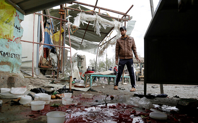 Hiện trường vụ nổ bom kép ở thủ đô Baghdad, Iraq.