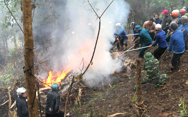 Different forces take part in a drill in forest fire fighting, search and rescue in Tram Tau district.