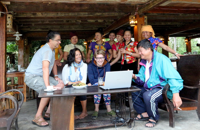 Domestic and foreign tourists at a homestay establishment in Nghia Lo.